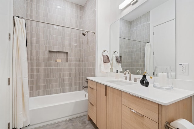 bathroom with shower / bath combination with curtain and vanity