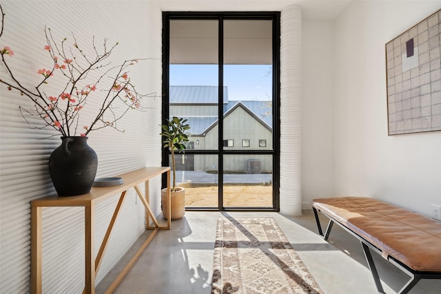 entryway with concrete floors