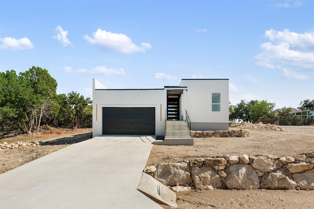 contemporary home with a garage