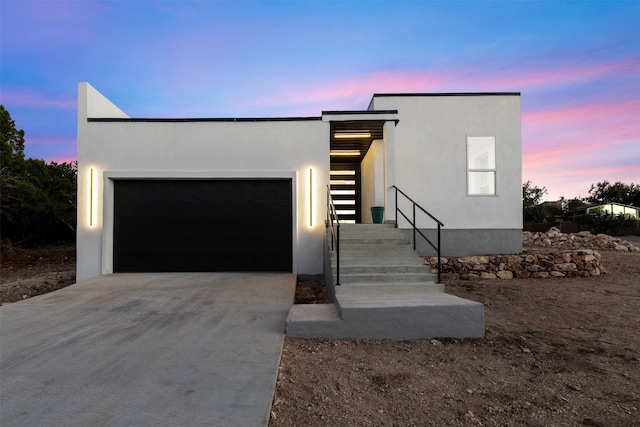 modern home featuring a garage