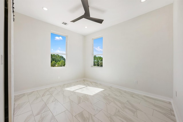 empty room featuring ceiling fan