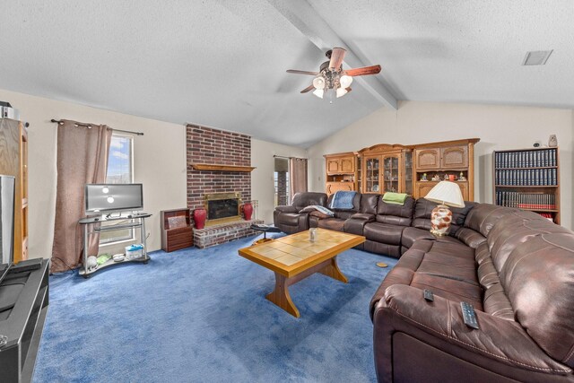 carpeted living room with a textured ceiling, ceiling fan, a fireplace, and lofted ceiling with beams