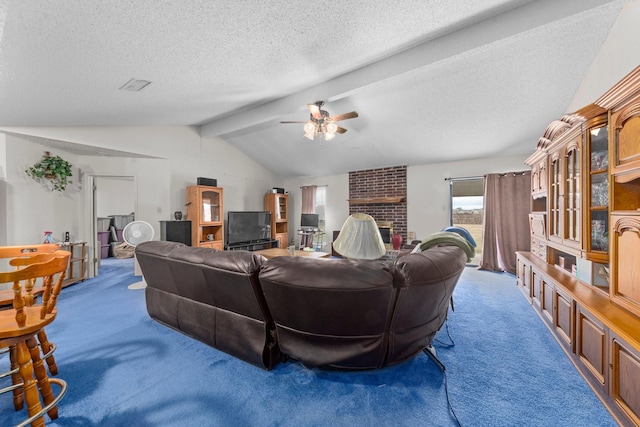 carpeted living room featuring a textured ceiling, a brick fireplace, ceiling fan, and lofted ceiling with beams