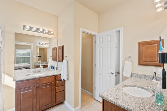 bathroom with vanity and tile patterned floors