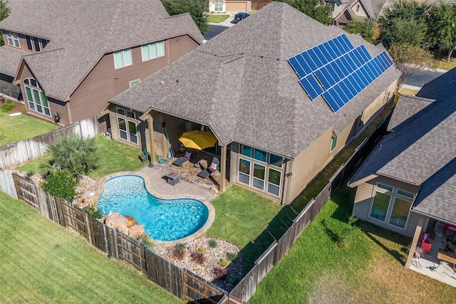 view of swimming pool with a lawn and a patio