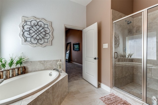 bathroom featuring tile patterned floors and plus walk in shower