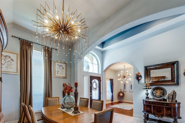 dining space featuring a notable chandelier