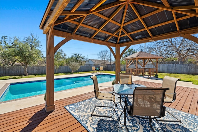 view of pool with a yard and a gazebo