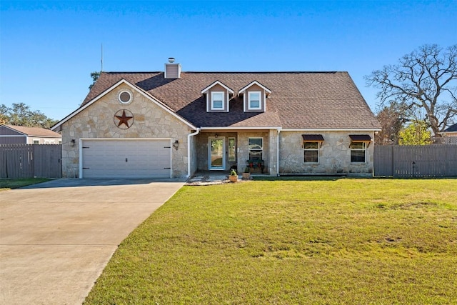 cape cod home with a garage and a front lawn