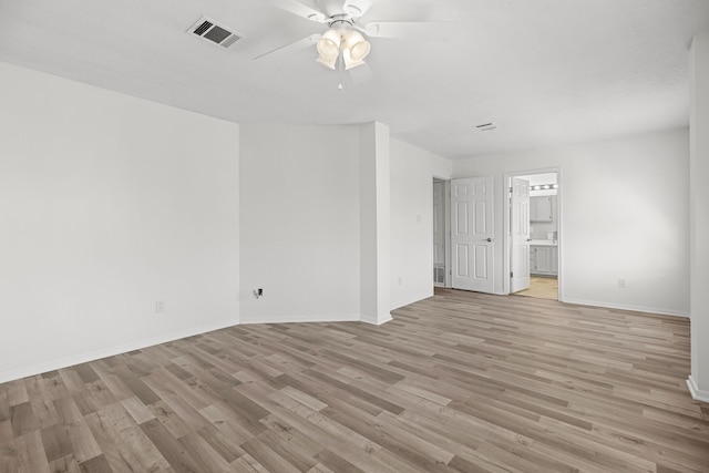 unfurnished room featuring ceiling fan and light hardwood / wood-style flooring