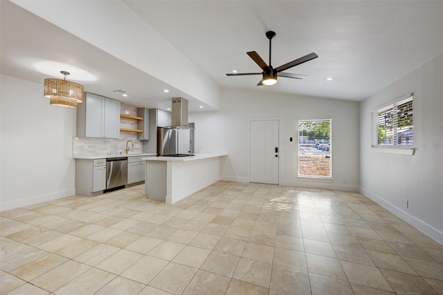 kitchen with tasteful backsplash, vaulted ceiling, dishwasher, kitchen peninsula, and island exhaust hood