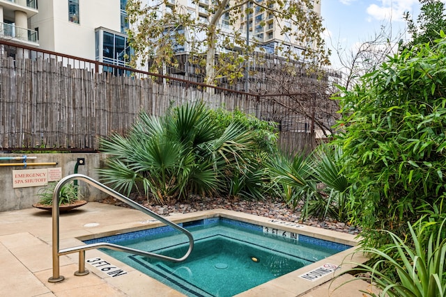 view of pool featuring a community hot tub