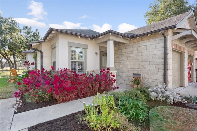 entrance to property featuring a garage