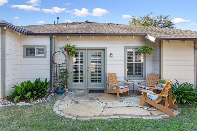 rear view of house featuring a patio area and french doors