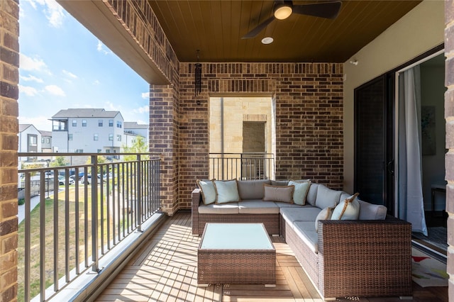 balcony featuring ceiling fan and an outdoor hangout area