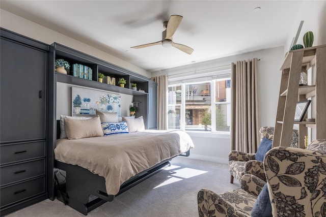 bedroom featuring light carpet and ceiling fan