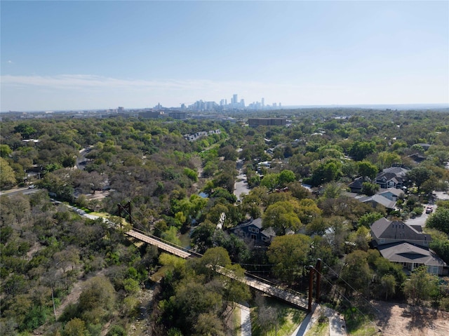 birds eye view of property featuring a city view