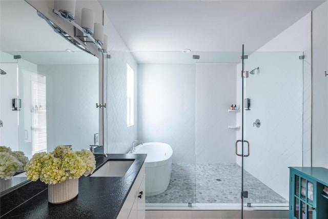 4007 Emory Peak Pass, Austin, TX 78731 - full bath with a freestanding bath, a shower stall, and vanity