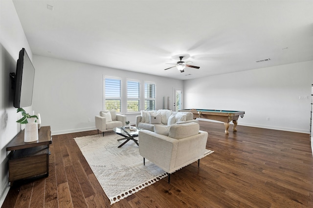 living room featuring dark wood-type flooring, ceiling fan, and pool table