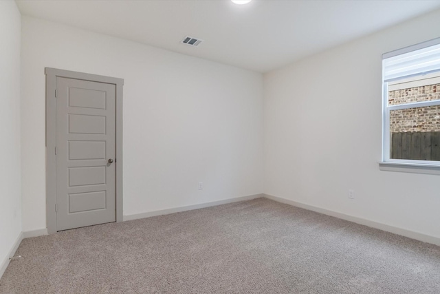 empty room featuring carpet floors