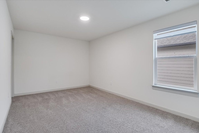 14117 Mcarthur Dr, Manor, TX 78653 - empty room with carpet and baseboards