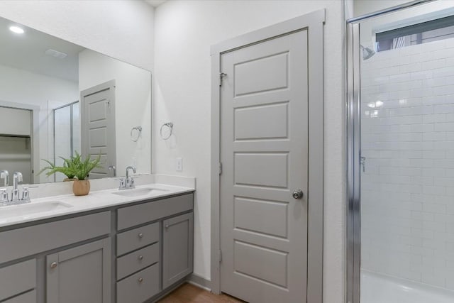 14117 Mcarthur Dr, Manor, TX 78653 - full bath featuring a stall shower and double vanity