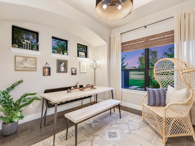 living area with hardwood / wood-style flooring