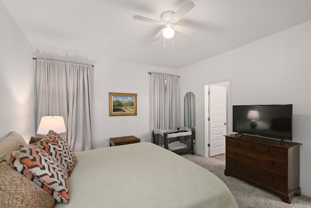 bedroom featuring ceiling fan and light colored carpet