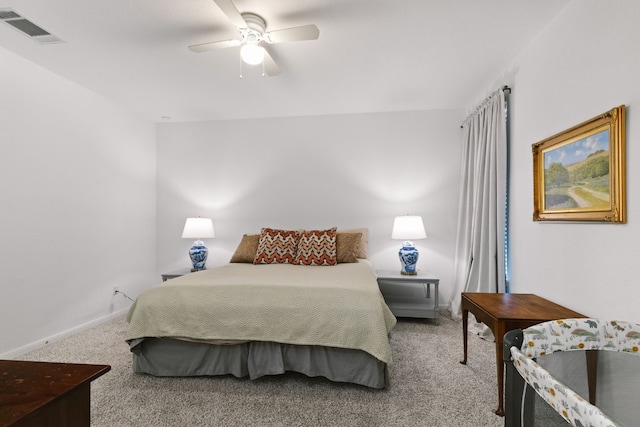 bedroom featuring carpet, visible vents, ceiling fan, and baseboards