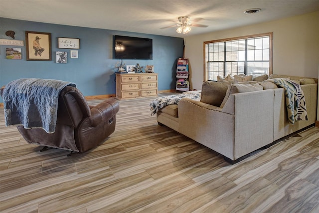 living room featuring ceiling fan