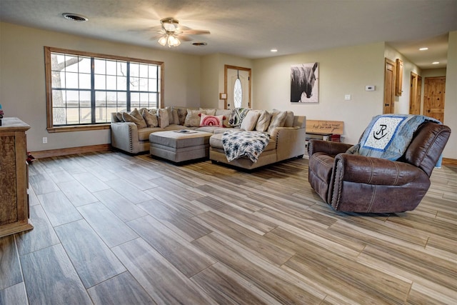 living room with ceiling fan