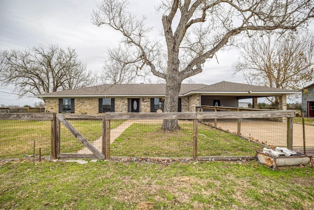 single story home featuring a front yard