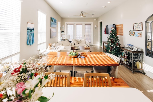 dining room featuring ceiling fan and light wood-type flooring