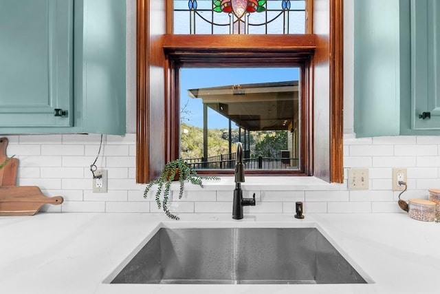 112 Center Cove Iii Loop, Spicewood, TX 78669 - kitchen view of light countertops and backsplash