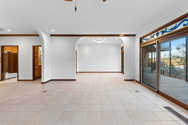 112 Center Cove Iii Loop, Spicewood, TX 78669 - empty room with arched walkways, ornamental molding, recessed lighting, and ceiling fan