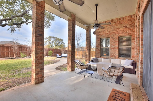 view of patio / terrace with ceiling fan and outdoor lounge area