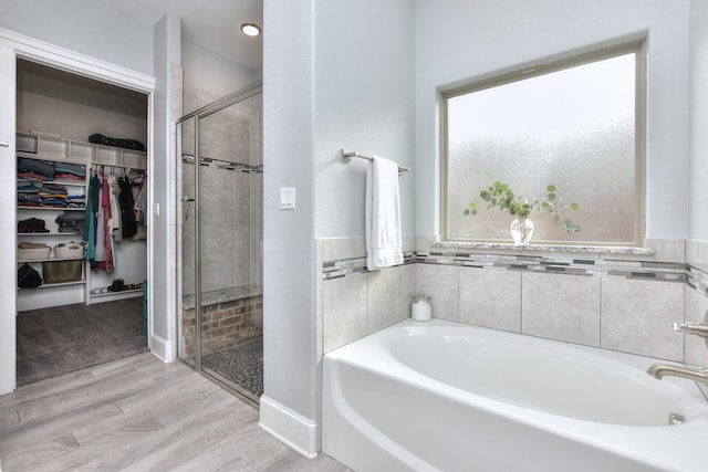 bathroom with plus walk in shower