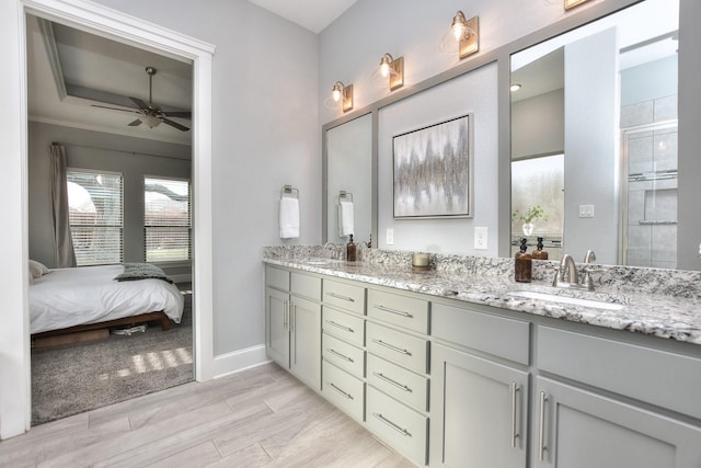 bathroom featuring vanity and ceiling fan