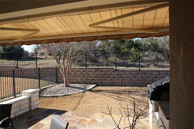 view of patio with fence