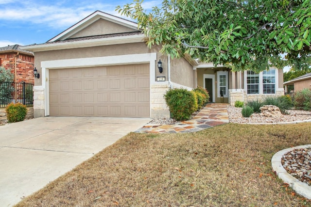 ranch-style house featuring a garage, stone siding, driveway, stucco siding, and a front yard