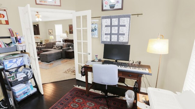 office space featuring hardwood / wood-style floors and french doors