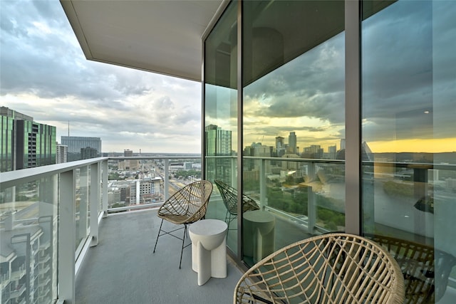 view of balcony at dusk