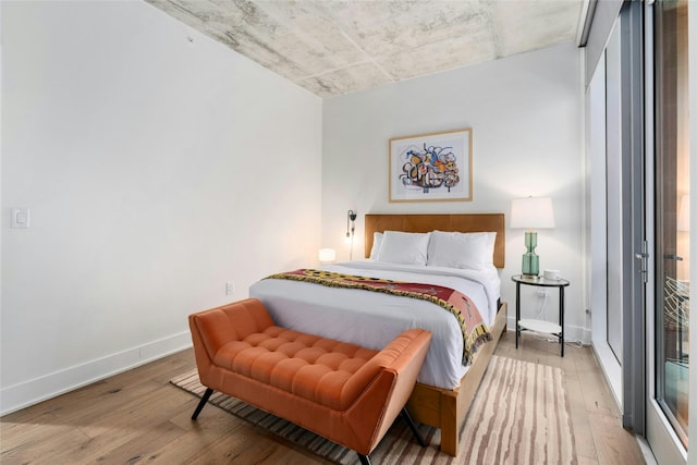 bedroom featuring wood-type flooring