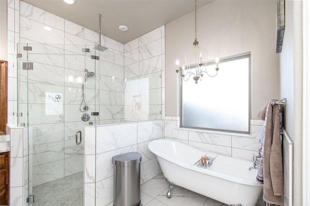 bathroom featuring independent shower and bath, tile walls, and a notable chandelier