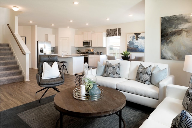 living room featuring dark hardwood / wood-style floors