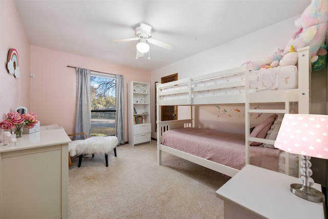 bedroom featuring light colored carpet and ceiling fan