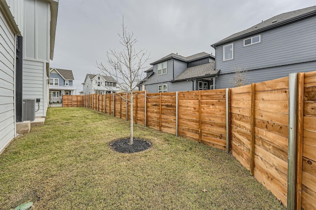 view of yard featuring central AC