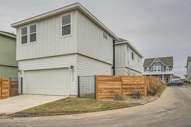 view of side of property featuring a garage