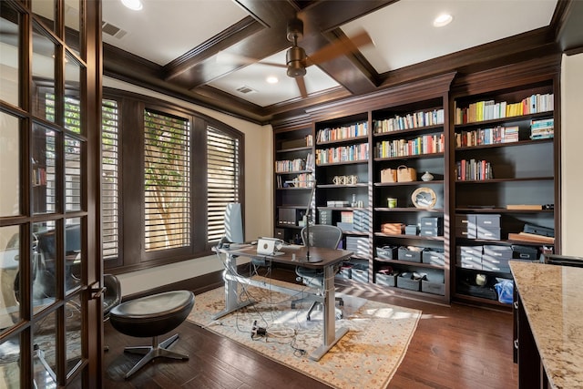 office space featuring dark hardwood / wood-style floors, ornamental molding, beamed ceiling, and coffered ceiling