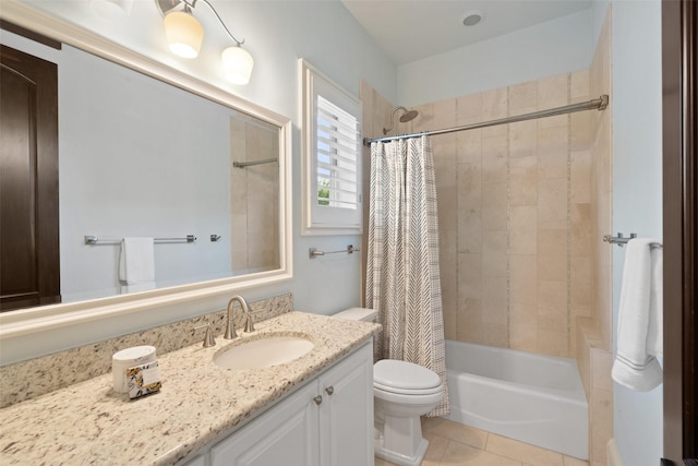 full bathroom featuring tile patterned floors, vanity, toilet, and shower / tub combo with curtain